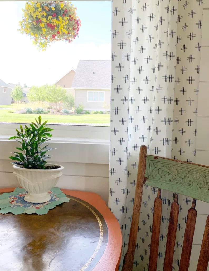 Cozy sitting nook with cushions and reading light