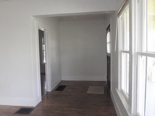 Joint front door on the right side of the house