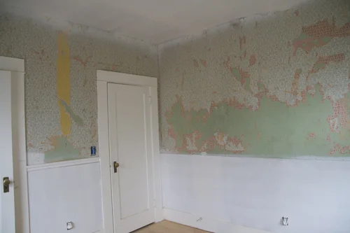 Pre-renovation image of room doors